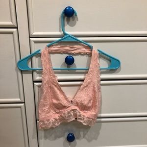 Peach-colored floral lace halter bralette